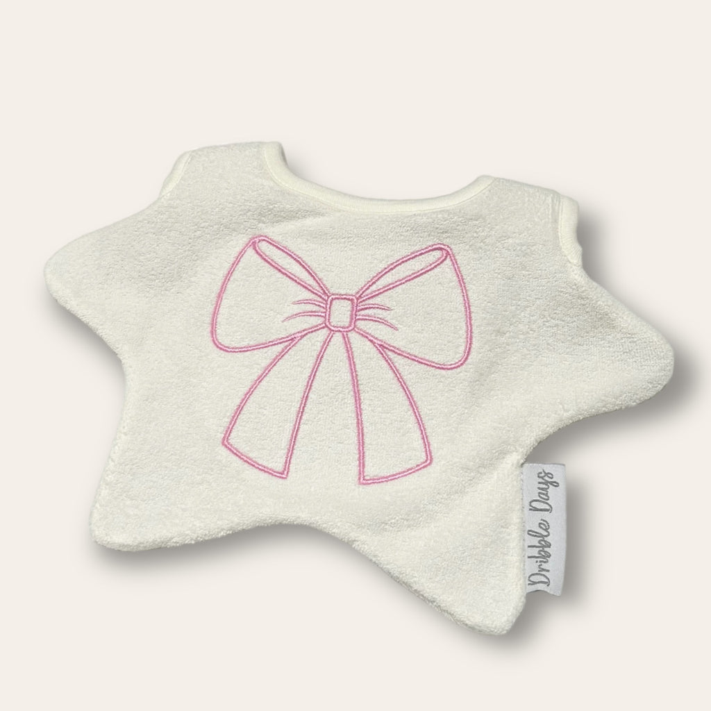 Baby bib with a big pink bow beautifully embroidered across the front