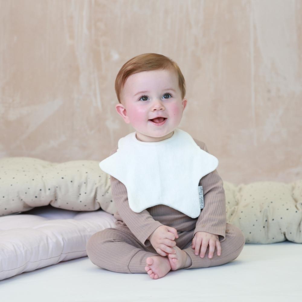 Baby wearing multipack pastel cream bib